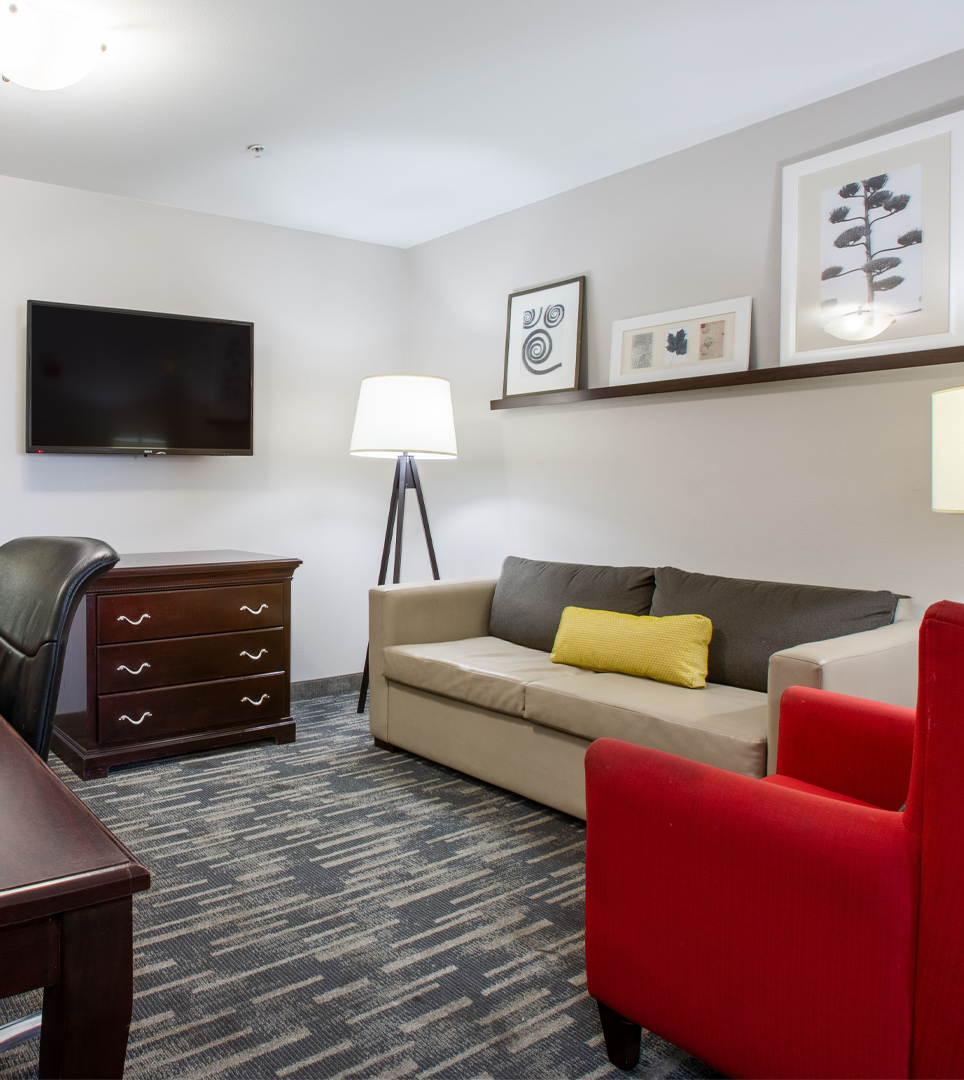 Suites Feature A Separate Living Room And Sofa Bed